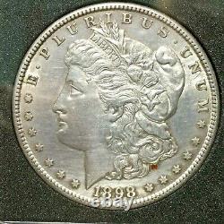 1898 S Morgan Silver Dollar HIGH GRADE. SOME TONING. PINWHEEL REFLECTION