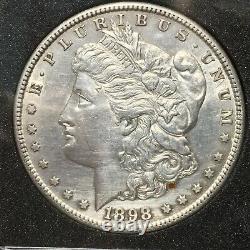 1898 S Morgan Silver Dollar HAUTE QUALITÉ. QUELQUES PATINES. REFLET EN ÉTOILE.
