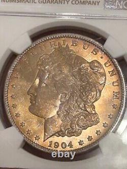 1904 O Morgan Silver Dollar NGC MS65 Haute Grade Beauté dorée aux tons.