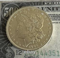 Dollar d'argent Morgan de haute qualité non circulé de 1884-P avec finition épreuve.