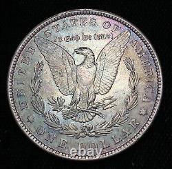 Dollar en argent 1881-P Morgan UNC. De haute qualité, magnifique patine bleu acier sur la bordure.