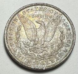 Dollar en argent Morgan de 1900, patiné et de haute qualité